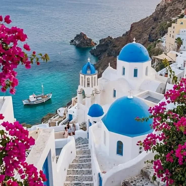 Santorini blue domes and bougainvillea